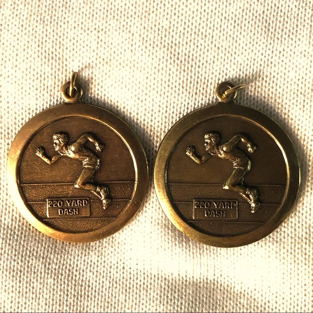 TWO 220 YARD DASH RUN PENDANTS BRONZE & BRASS TONE
